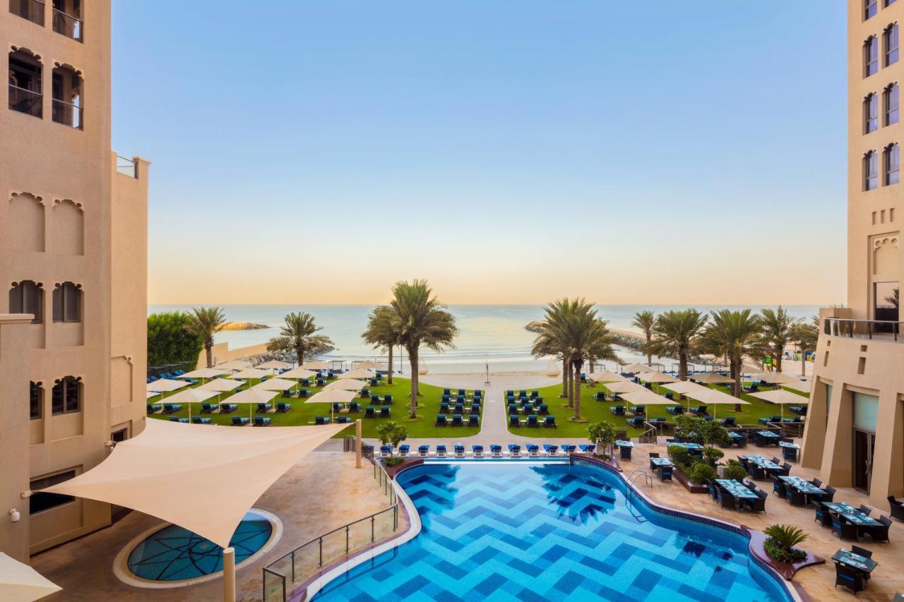 Bahi Ajman Palace Hotel Exterior photo The pool at the Jumeirah Beach Hotel