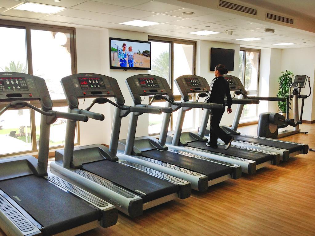 Bahi Ajman Palace Hotel Exterior photo Treadmills in a gym